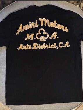 AMIRI Black Tee with Gold Script & Club Emblem